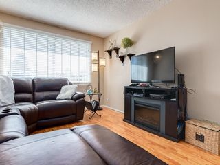 Photo 5: 6131 BEAVER DAM Way NE in Calgary: Thorncliffe House for sale : MLS®# C4184373
