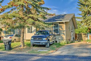 Photo 1: 205 Pineset Place NE in Calgary: Pineridge Semi Detached (Half Duplex) for sale : MLS®# A2052172
