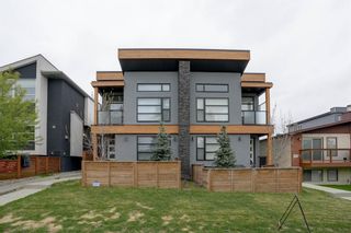 Photo 1: 2 1926 25A Street SW in Calgary: Richmond Row/Townhouse for sale : MLS®# A1221583