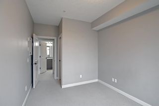 Photo 17: 112 35 Aspenmont Heights SW in Calgary: Aspen Woods Apartment for sale : MLS®# A1161668