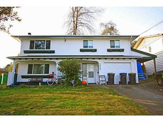 Photo 1: 3865 WELLINGTON Street in Port Coquitlam: Oxford Heights House for sale : MLS®# V1094588