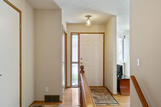 Photo 3: 21 Sandarac Circle NW in Calgary: Sandstone Valley Row/Townhouse for sale : MLS®# A2048786