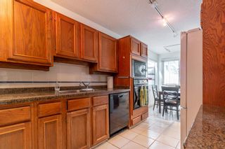 Photo 16: 10 Woodmeadow Close SW in Calgary: Woodlands Semi Detached for sale : MLS®# A1242856