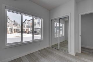 Photo 5: 802 335 Creekside Boulevard SW in Calgary: C-168 Row/Townhouse for sale : MLS®# A2118245