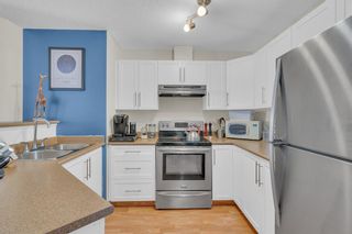 Photo 3: 4116 10 Prestwick Bay SE in Calgary: McKenzie Towne Apartment for sale : MLS®# A2027155