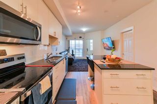 Photo 8: 2204 298 Sage Meadows Park NW in Calgary: Sage Hill Apartment for sale : MLS®# A2093979