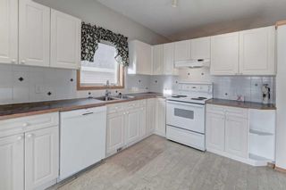 Photo 9: 1615 Woodside Boulevard NW: Airdrie Detached for sale : MLS®# A2104240
