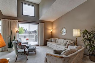 Photo 5: 48 Strathclair Place SW in Calgary: Strathcona Park Detached for sale : MLS®# A2052523