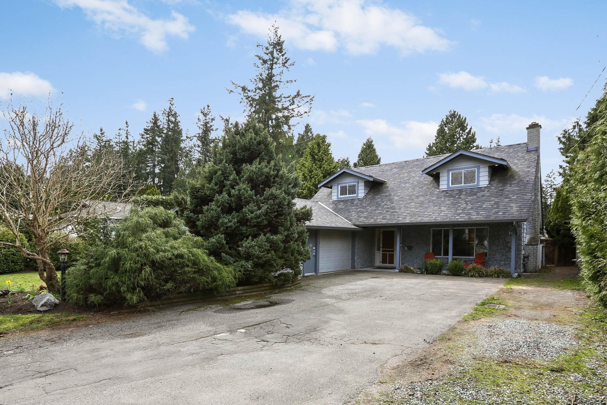 Main Photo: 3911 205A Street in Langley: Brookswood Langley House for sale : MLS®# R2674723