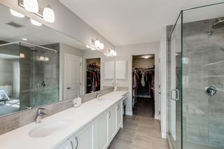 Photo 19: 25 Crestbrook Way SW in Calgary: Crestmont Detached for sale : MLS®# A1253074