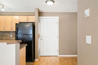 Photo 7: 8113 70 Panamount Drive NW in Calgary: Panorama Hills Apartment for sale : MLS®# A1259466