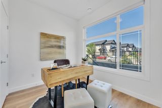 Photo 3: 123 101 Panatella Square in Calgary: Panorama Hills Row/Townhouse for sale : MLS®# A1259345