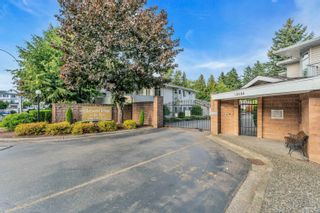 Photo 1: 221 10584 153 Street in Surrey: Guildford Townhouse for sale in "Glenwood Village" (North Surrey)  : MLS®# R2719446