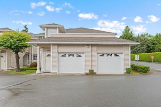 Photo 1: 201 9310 KING GEORGE Boulevard in Surrey: Bear Creek Green Timbers Townhouse for sale in "THE HUNTSFIELD" : MLS®# R2895296
