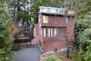 Photo 1: 1045 BLUE GROUSE Way in North Vancouver: Grouse Woods House for sale : MLS®# R2748139