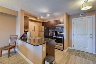 Photo 3: 8414 403 Mackenzie Way SW: Airdrie Apartment for sale : MLS®# A1206659