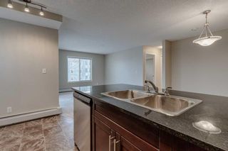 Photo 12: 9301 403 Mackenzie Way SW: Airdrie Apartment for sale : MLS®# A2090756