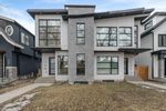 Main Photo: 129 7 Avenue NE in Calgary: Crescent Heights Semi Detached (Half Duplex) for sale : MLS®# A2122641