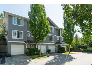 Photo 1: 73 15155 62A Avenue in Surrey: Sullivan Station Townhouse for sale in "Oaklands" : MLS®# R2394046