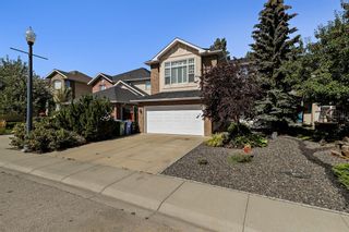 Photo 2: 77 Strathridge Crescent SW in Calgary: Strathcona Park Detached for sale : MLS®# A1254965