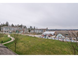 Photo 19: 205 16398 64 Avenue in Surrey: Cloverdale BC Condo for sale in "THE RIDGE AT BOSE FARMS" (Cloverdale)  : MLS®# R2339810