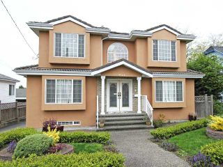 Photo 1: 4723 MOSS Street in Vancouver: Collingwood VE House for sale (Vancouver East)  : MLS®# V891321