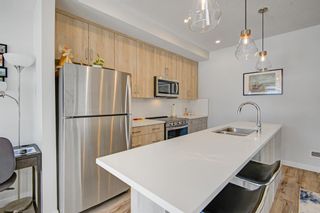 Photo 6: 304 71 Shawnee Common SW in Calgary: Shawnee Slopes Apartment for sale : MLS®# A2027127
