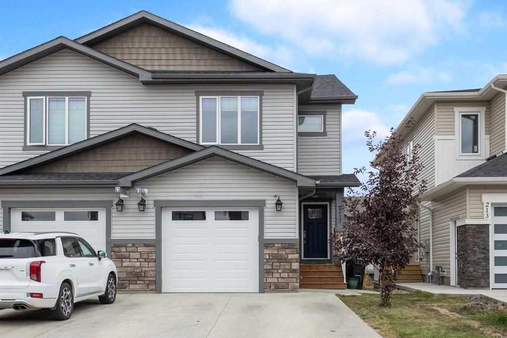 Main Photo: 217 Siltstone Place: Fort McMurray Semi Detached (Half Duplex) for sale : MLS®# A2078068