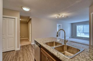 Photo 4: 412 20 Kincora Glen Park NW in Calgary: Kincora Apartment for sale : MLS®# A1144982