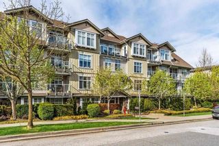 Photo 2: 404 15323 17A Avenue in Surrey: King George Corridor Condo for sale in "SEMIAMOO PLACE" (South Surrey White Rock)  : MLS®# R2822142