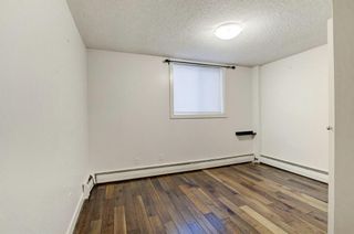 Photo 12: 101 4127 Bow Trail SW in Calgary: Rosscarrock Apartment for sale : MLS®# A1157364