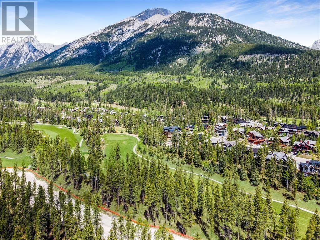 Main Photo: 412 Mountain Tranquility Place in Canmore: Vacant Land for sale : MLS®# A2049449