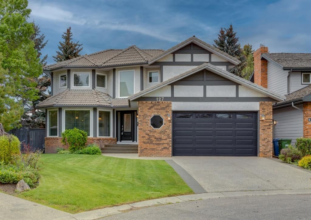 Main Photo: 127 Woodhaven Place SW in Calgary: Woodbine Detached for sale : MLS®# A1230271
