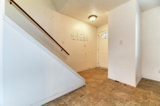 Photo 5: 7404 10 Street NW in Calgary: Huntington Hills Semi Detached (Half Duplex) for sale : MLS®# A2021530