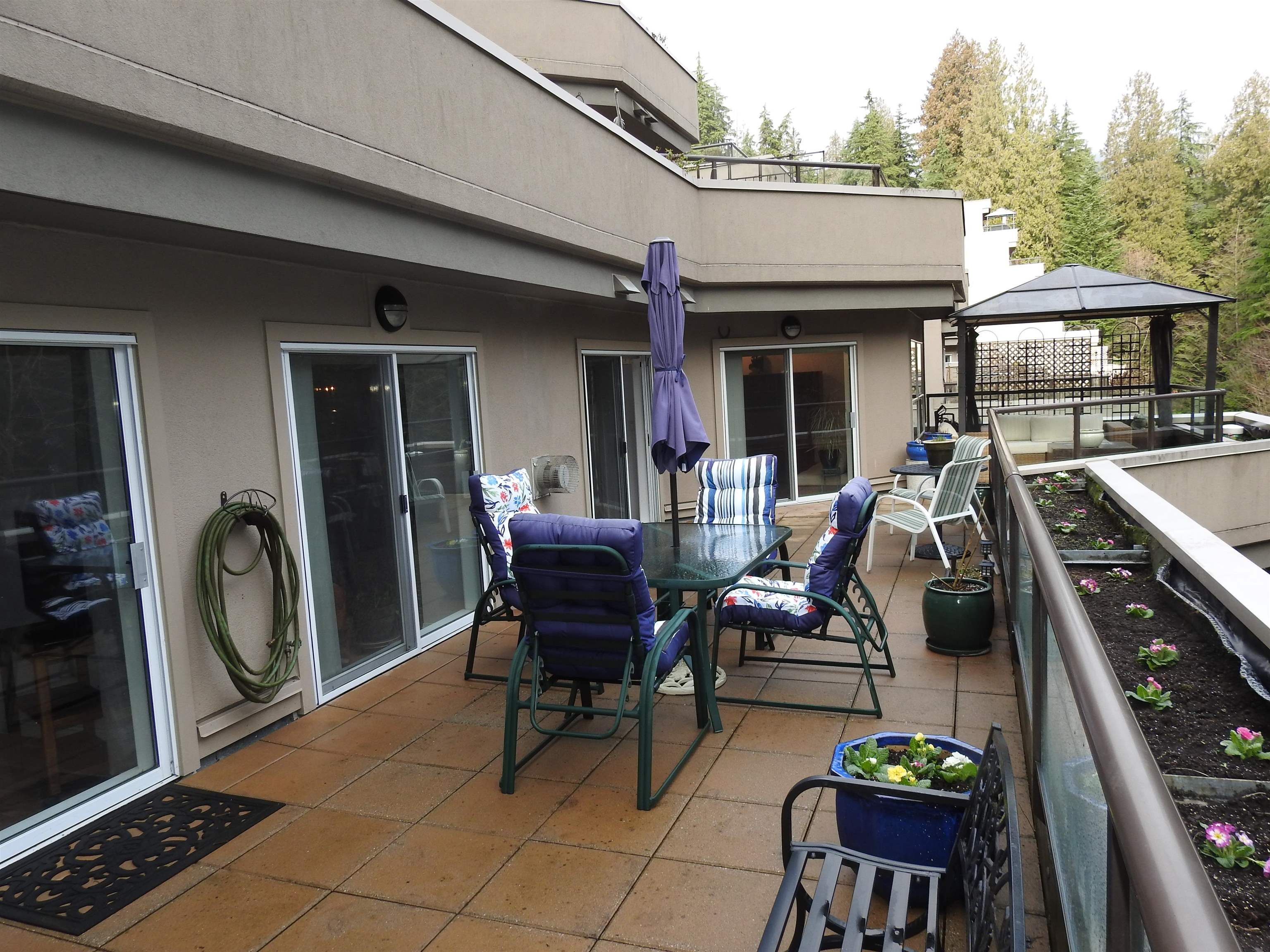 Main Photo: 301 1500 OSTLER COURT in North Vancouver: Indian River Condo for sale : MLS®# R2747570