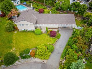 Photo 1: 780 KILKEEL Place in North Vancouver: Delbrook House for sale : MLS®# R2728067