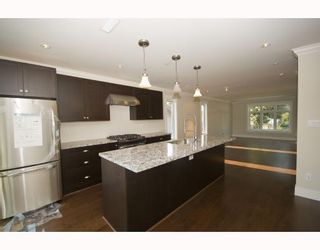 Photo 3: 482 E 17TH Avenue in Vancouver: Fraser VE House for sale in "MAIN STREET" (Vancouver East)  : MLS®# V772640