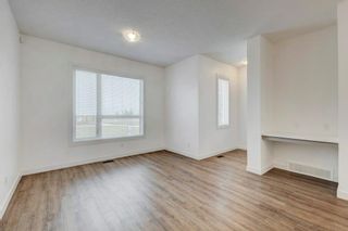 Photo 5: 132 Evanscrest Manor NW in Calgary: Evanston Row/Townhouse for sale : MLS®# A2047618