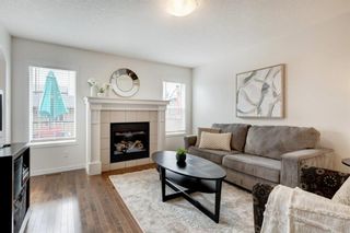 Photo 1: 63 Autumn Crescent SE in Calgary: Auburn Bay Detached for sale : MLS®# A1229141