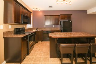 Photo 2: 24 45 Ironstone Drive: Red Deer Row/Townhouse for sale : MLS®# A2004693