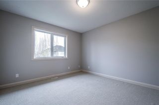 Photo 22: 242 STRATHRIDGE Place SW in Calgary: Strathcona Park Detached for sale : MLS®# C4246259