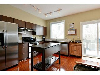 Photo 5: 59 15075 60 Avenue in Surrey: Sullivan Station Townhouse for sale in "Natures Walk" : MLS®# F1435110