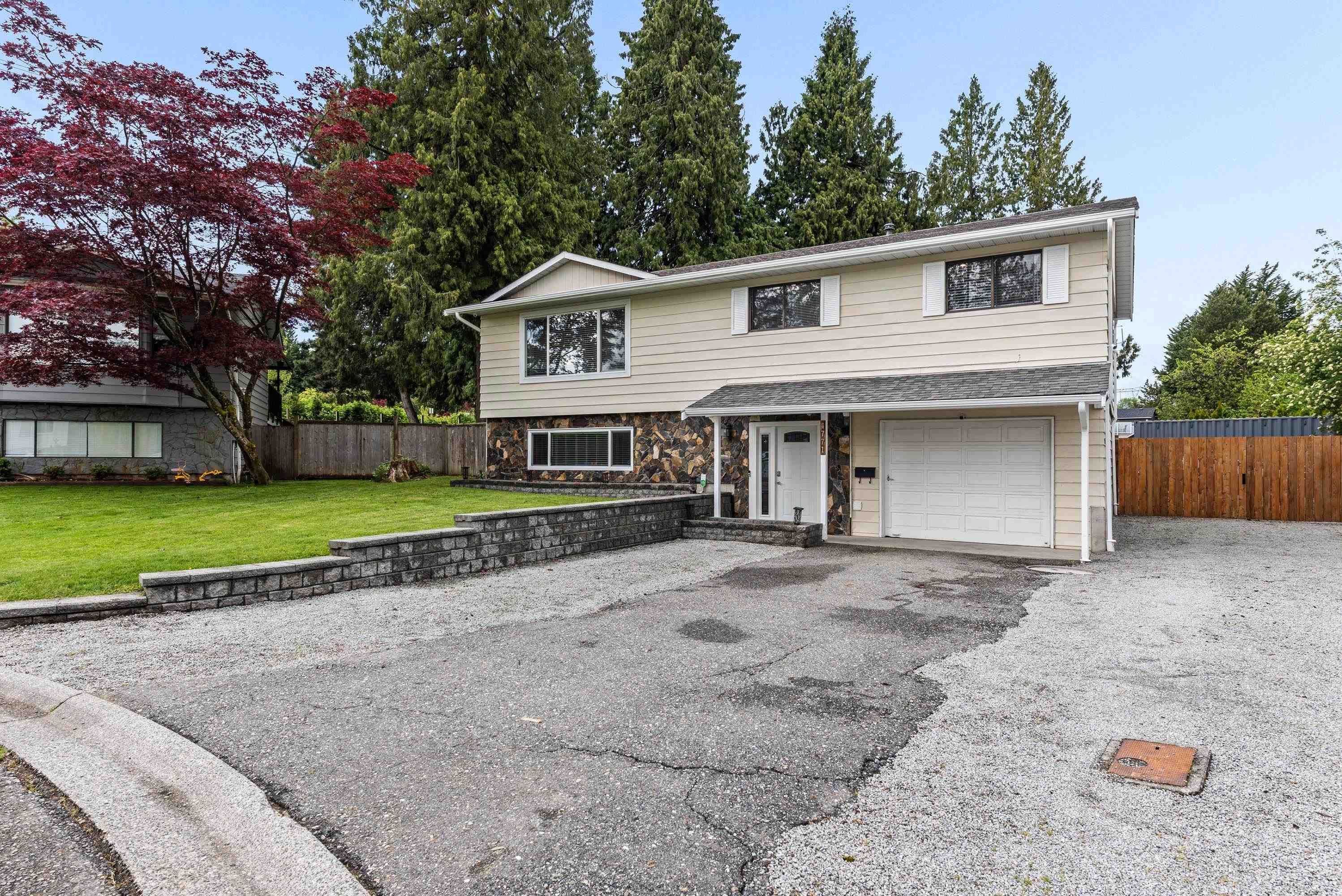 Main Photo: 4771 199A Street in Langley: Langley City House for sale : MLS®# R2703130