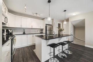 Photo 6: 553 Redstone View NE in Calgary: Redstone Row/Townhouse for sale : MLS®# A2034156