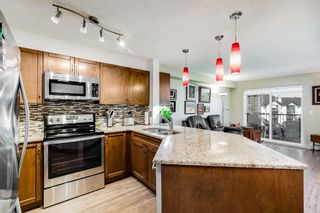 Photo 5: 7403 304 Mackenzie Way SW: Airdrie Apartment for sale : MLS®# A1251468