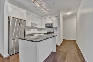 Photo 1: 201 13628 81A Avenue in Surrey: Bear Creek Green Timbers Condo for sale in "Kings Landing" : MLS®# R2523398