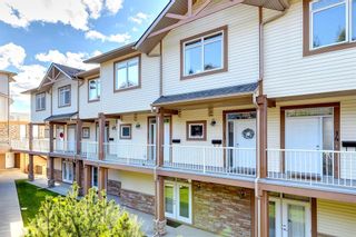 Photo 2: 9 133 Rockyledge View NW in Calgary: Rocky Ridge Row/Townhouse for sale : MLS®# A2002655