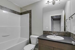 Photo 15: 217 Sunset Point: Cochrane Row/Townhouse for sale : MLS®# A2120759