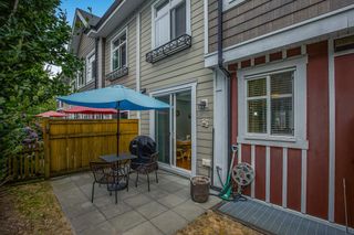 Photo 34: 101 20738 84 Avenue in Langley: Willoughby Heights Townhouse for sale in "Yorkson Creek" : MLS®# R2731127