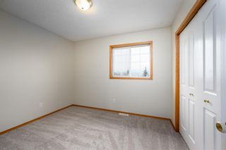 Photo 19: 208 Quigley Drive: Cochrane Semi Detached (Half Duplex) for sale : MLS®# A2050566